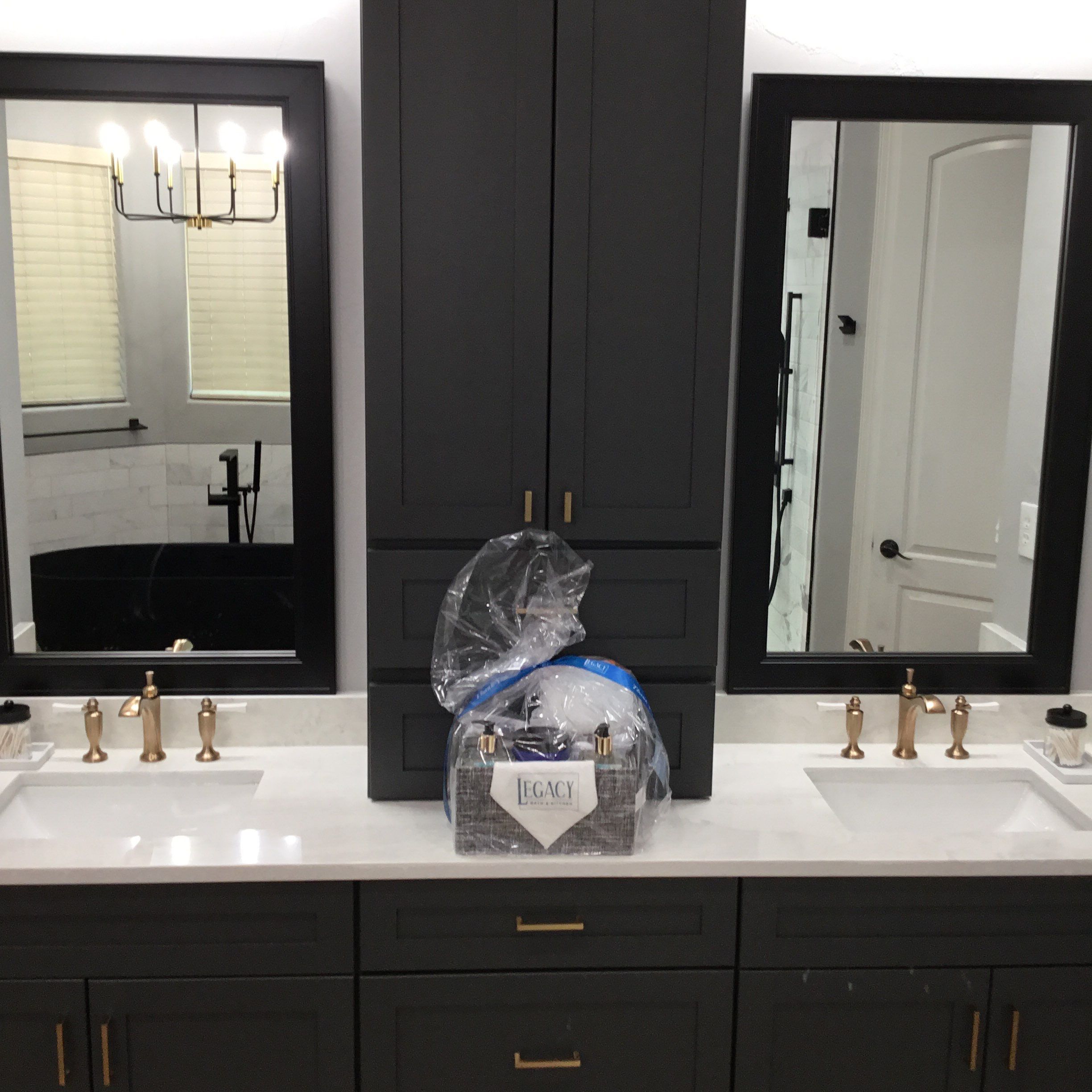 bathroom renovation by legacy bath and kitchen with a double sink vanity and custom fixtures