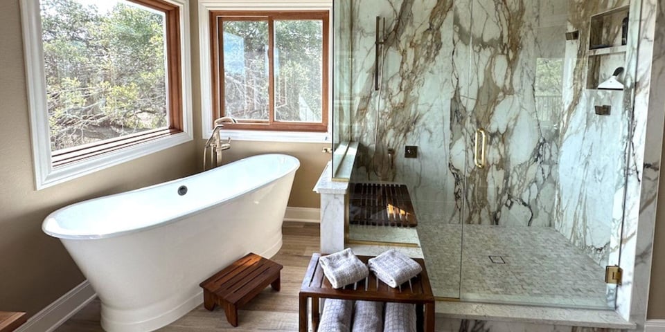 Bathrom Remodel with Marble Shower Tile and Free Standing Tub