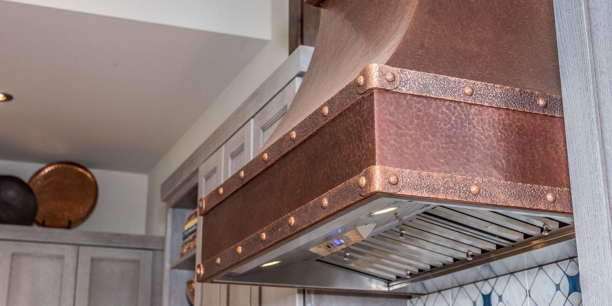 copper vent hood in a custom kitchen remodel in san antonio