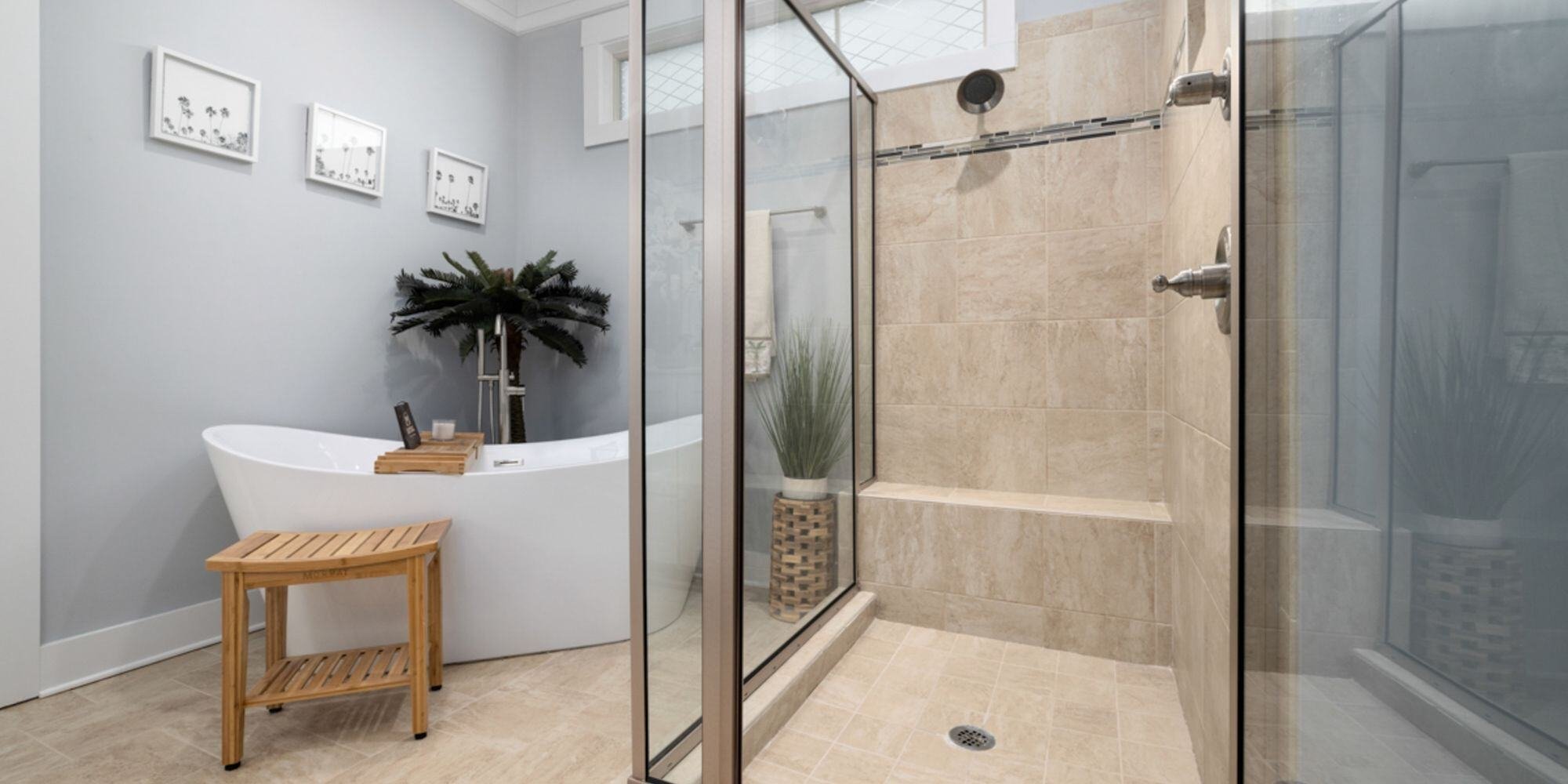 bathroom renovation with free standing tub and walk in shower with gray painted walls