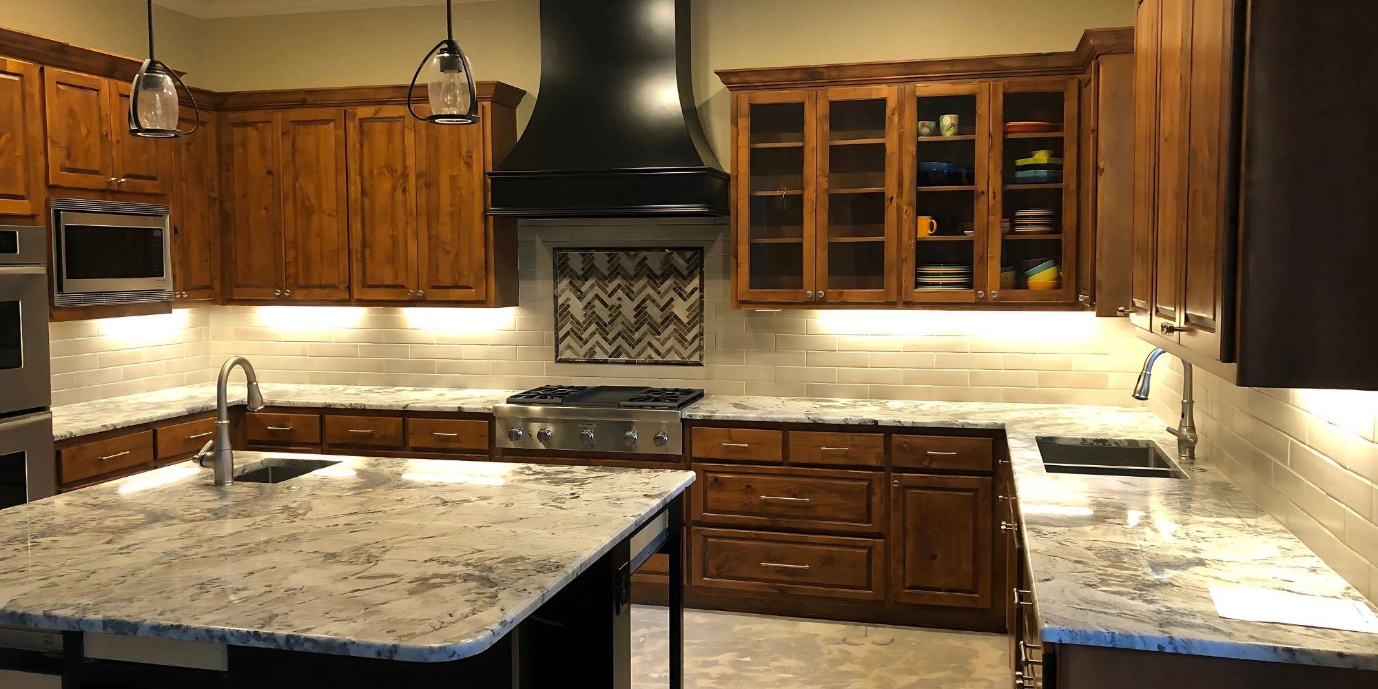 natural wood cabinets, large kitchen island, and a dark statement hood in a san antonio kitchen remodel